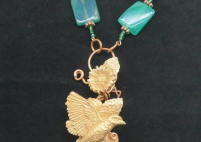 Copper and Bronze Bird in Flight