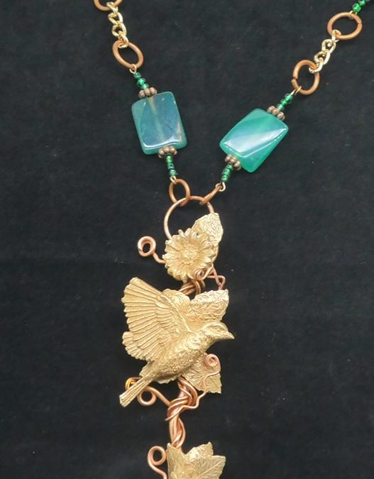 Copper and Bronze Bird in Flight