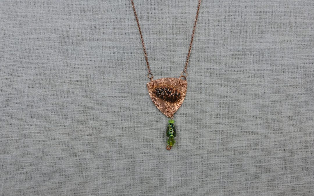 Copper Pine Cone Shield